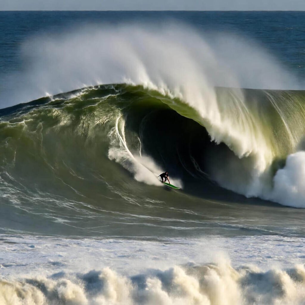 Nazaré’s giant waves, the ultimate thrill in extreme surfing spots.