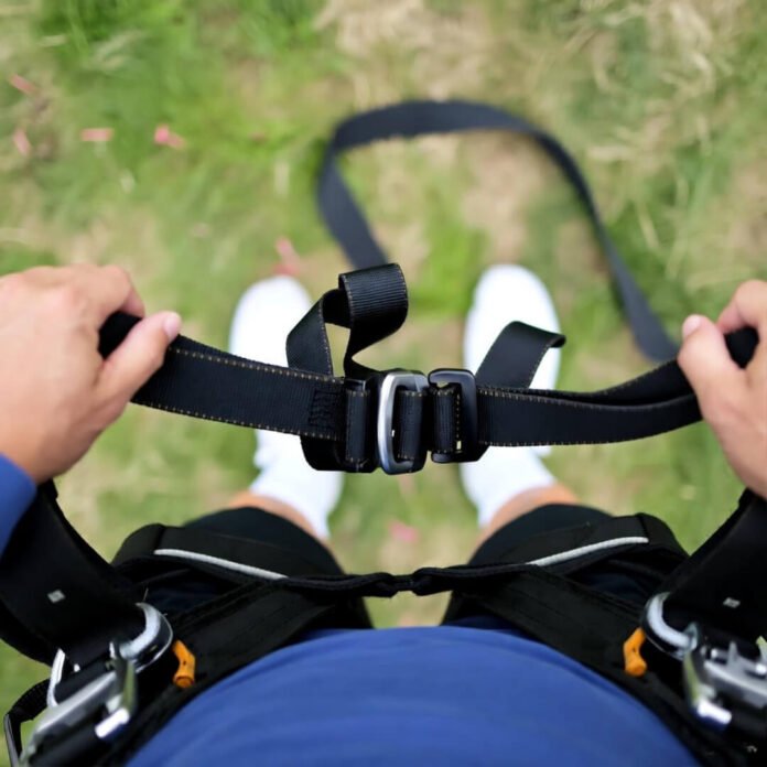 My chaotic view gearing up at a tandem skydiving center, socks and all.